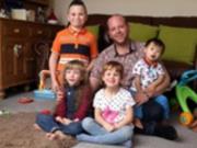 Гомосексуал усыновил пятеро детей-инвалидов