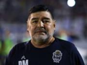 Футболка Марадоны, видавшая виды, продана на аукционе