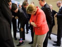 Меркель оценила  натовские  носки Трюдо