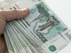 Россияне зарабатывают на курсе рубля