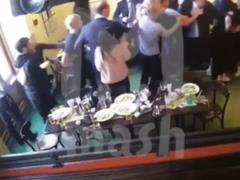 Били стулом и кулаками: в Сети появилось видео брутального избиения чиновников российскими футболистами